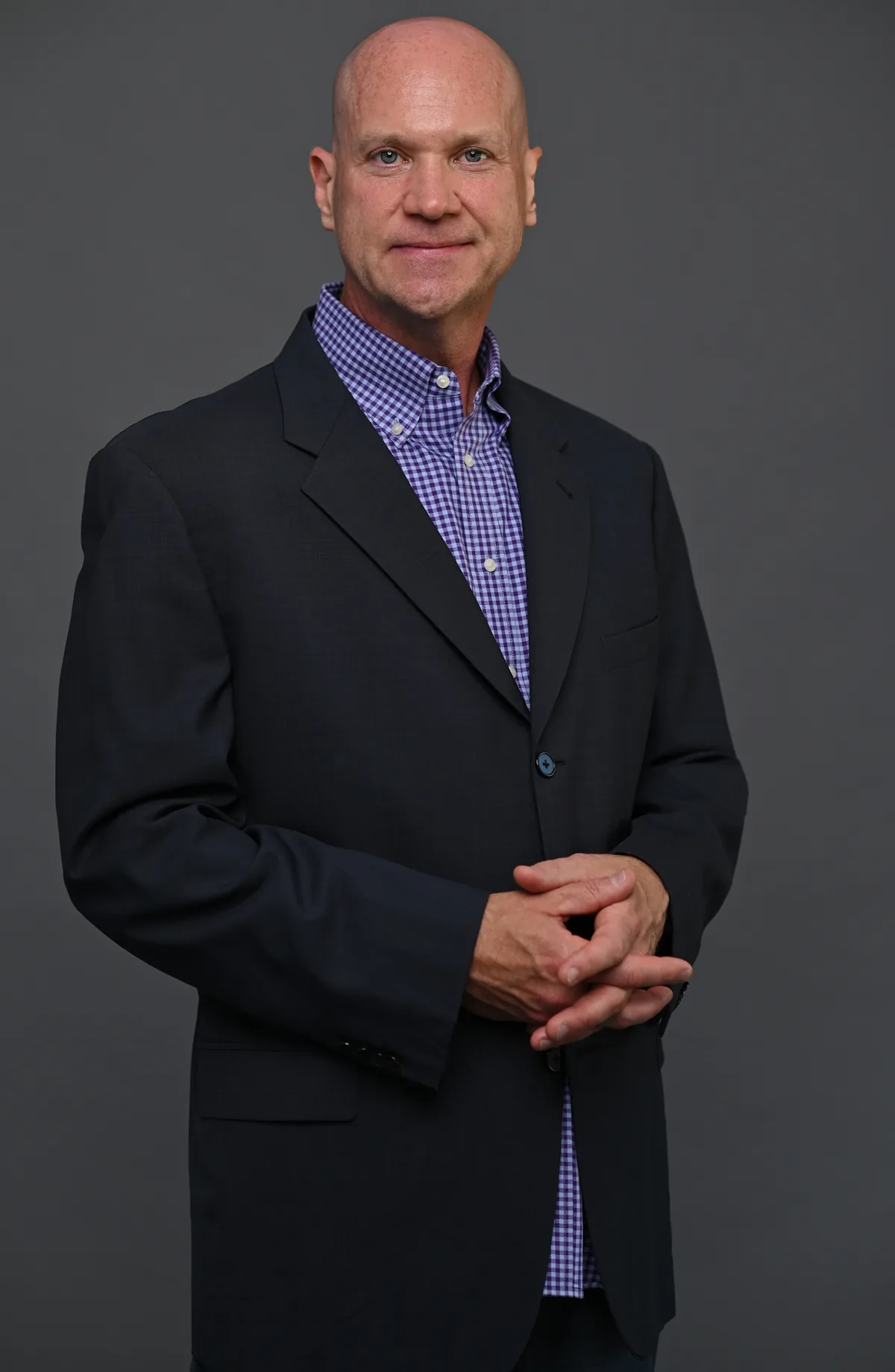 Jody McNamer seated, in conversation